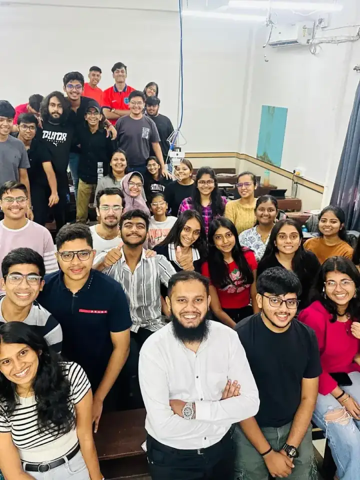 Shezad Ali Khan with a class of students at Hinduja College